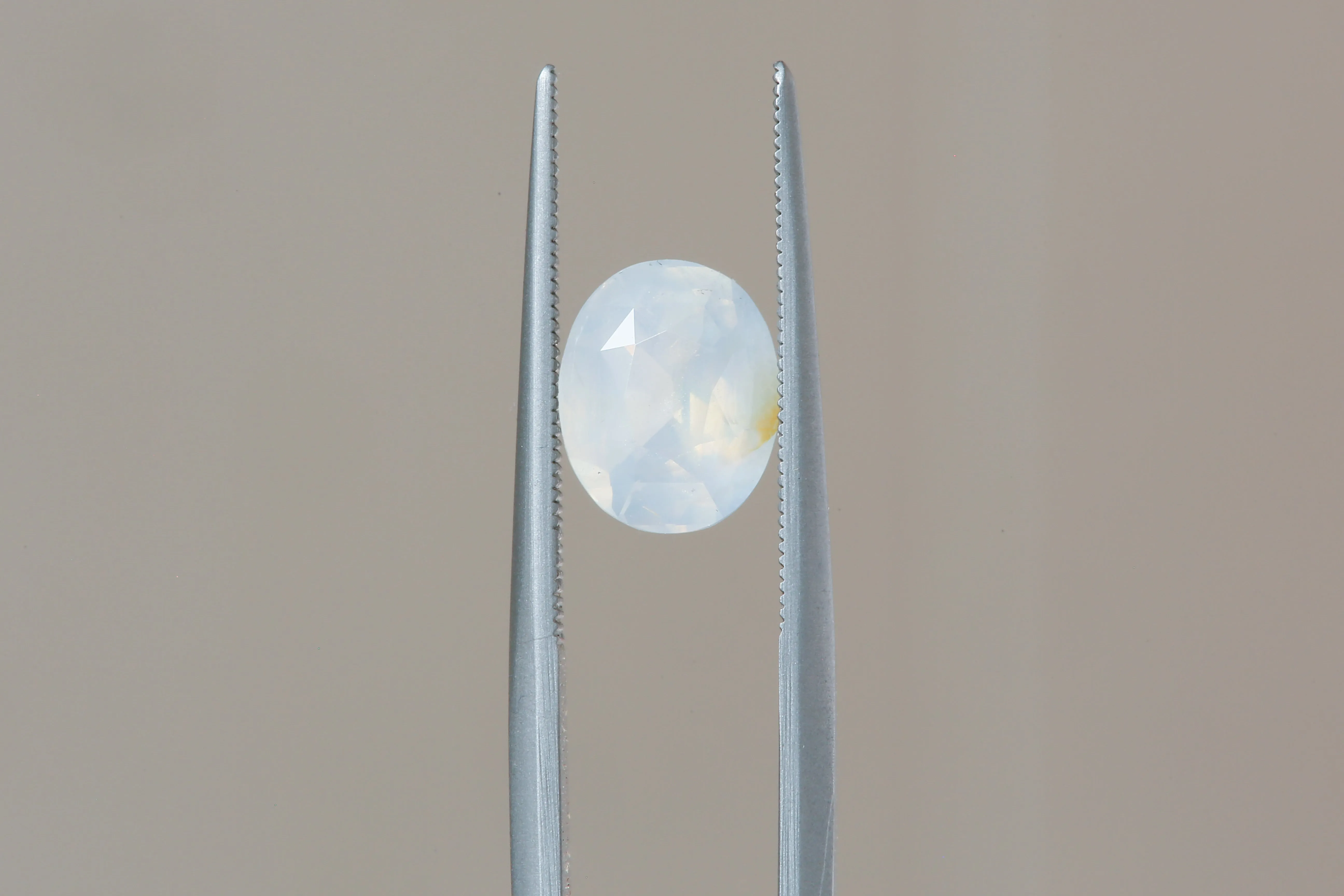 2.56 Carat Natural Opalescent Pale Blue White Oval Sapphire
