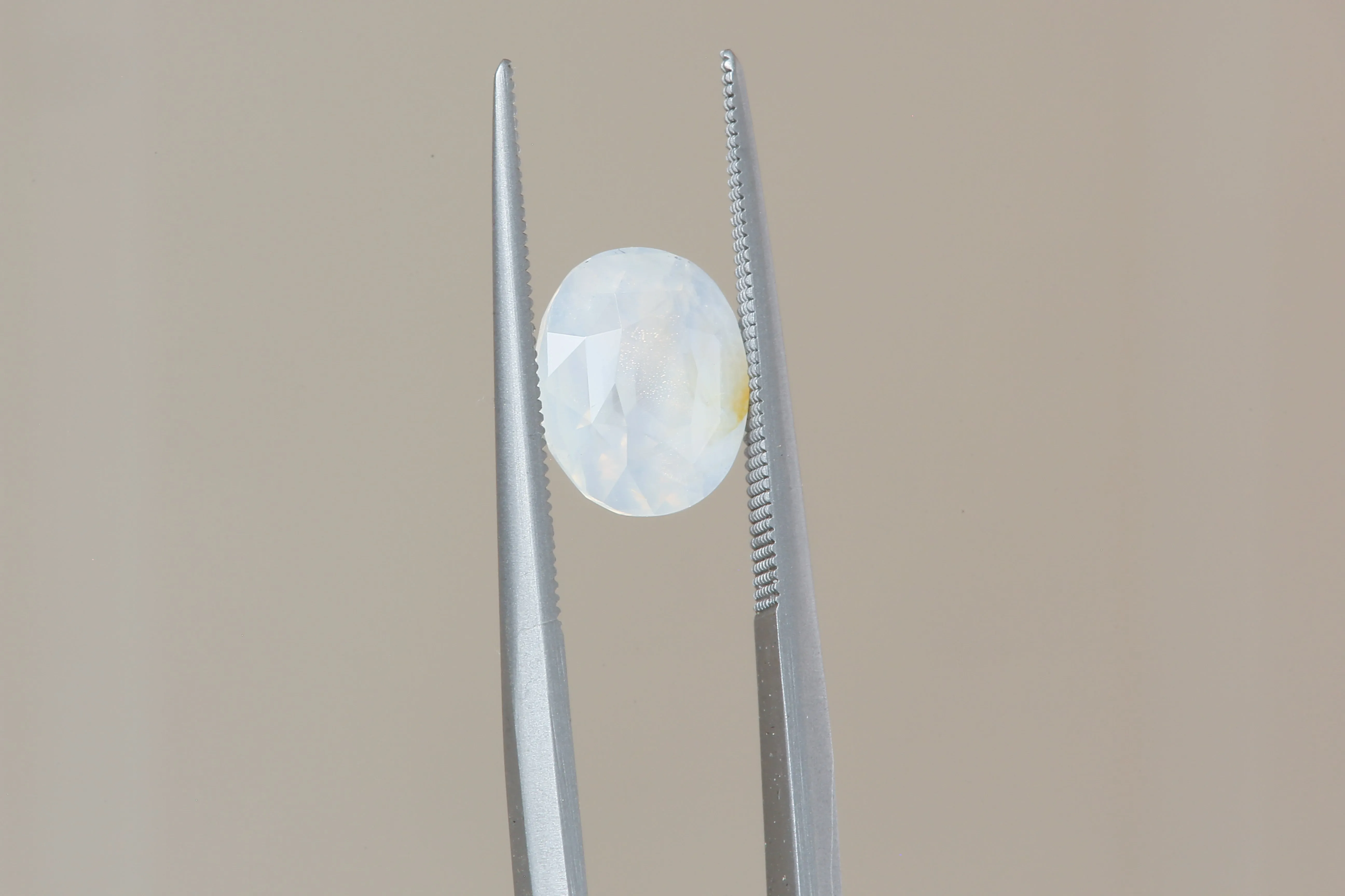 2.56 Carat Natural Opalescent Pale Blue White Oval Sapphire