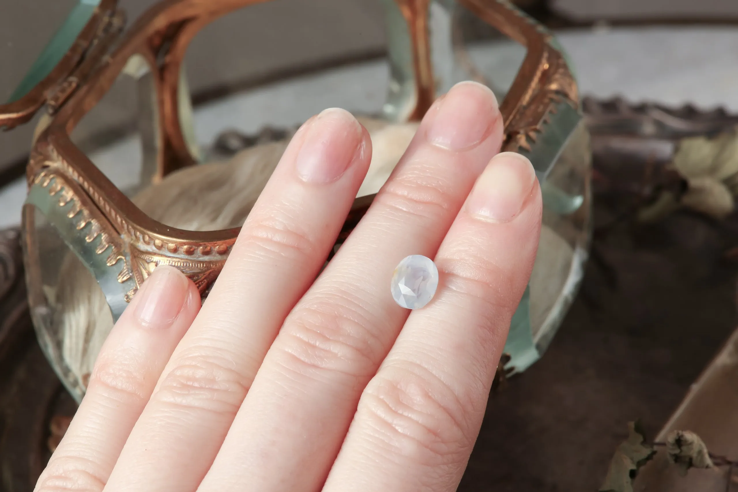 2.56 Carat Natural Opalescent Pale Blue White Oval Sapphire