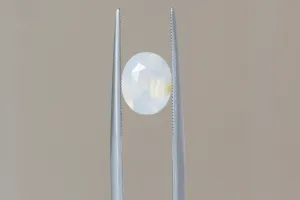 2.56 Carat Natural Opalescent Pale Blue White Oval Sapphire