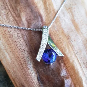 Handcrafted Tanzanite with Eight Diamond Ribbon Pendant