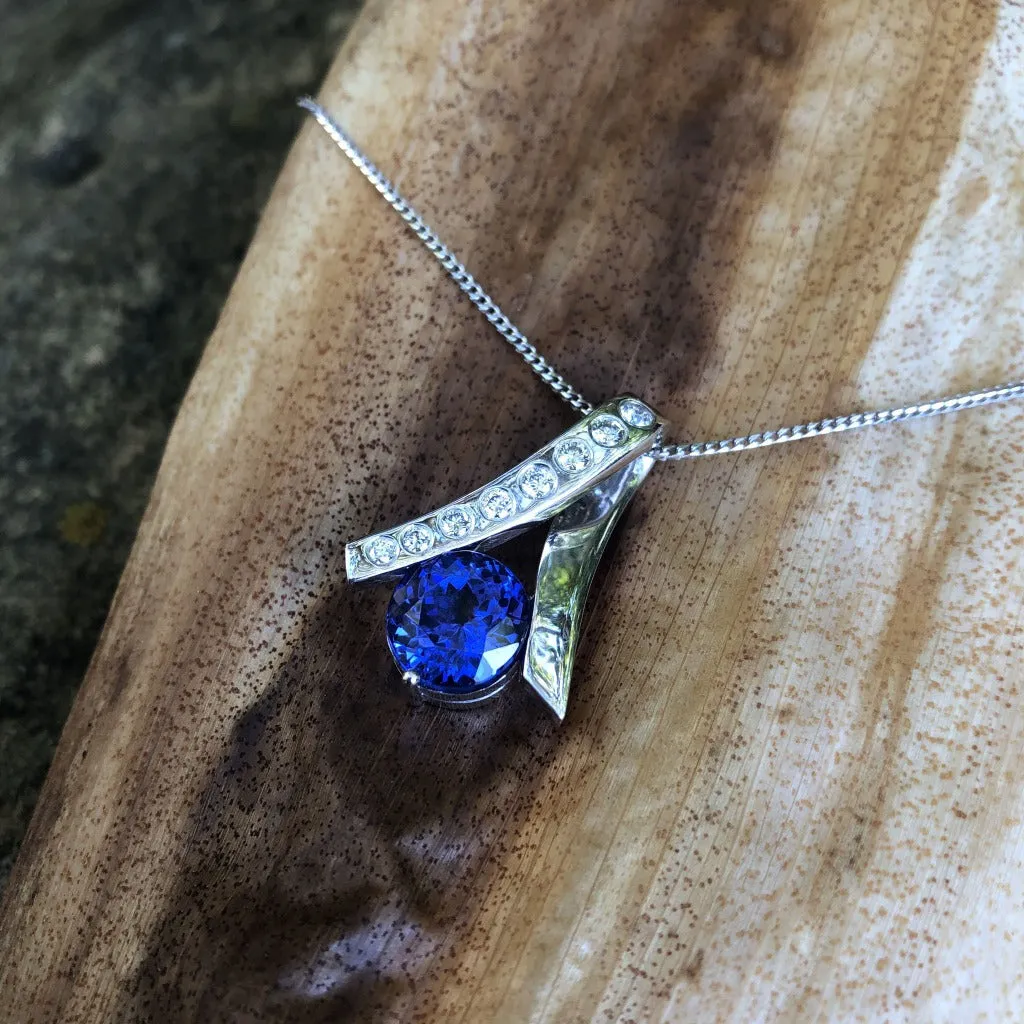 Handcrafted Tanzanite with Eight Diamond Ribbon Pendant