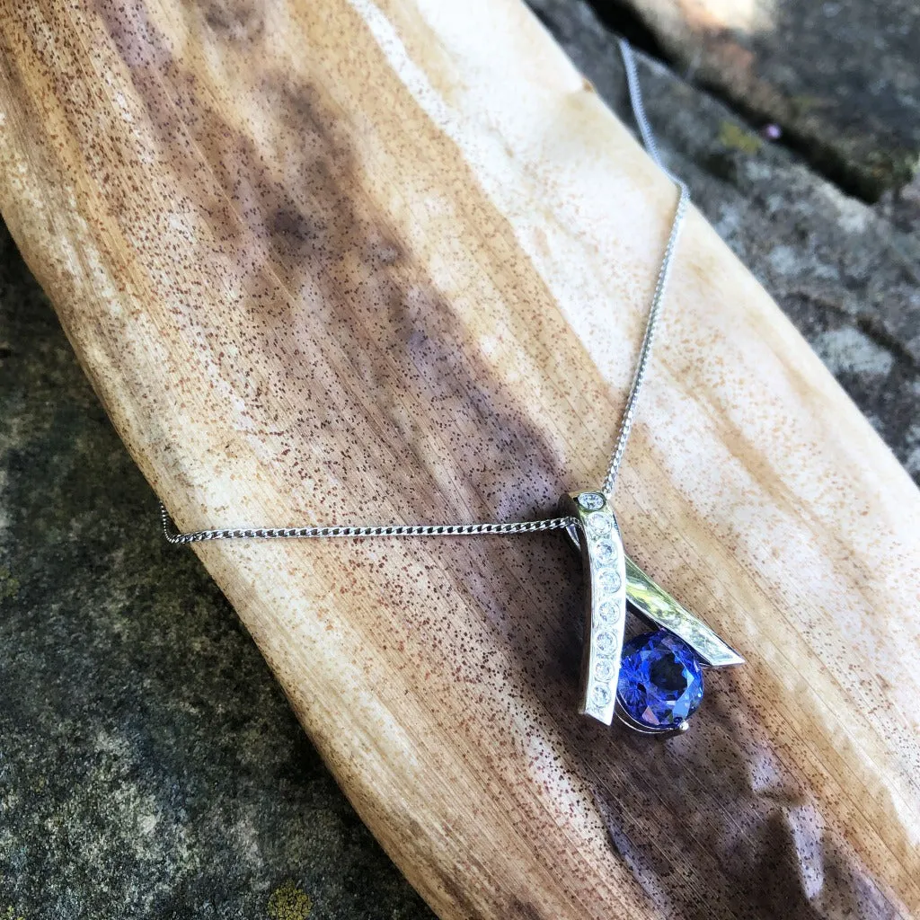 Handcrafted Tanzanite with Eight Diamond Ribbon Pendant