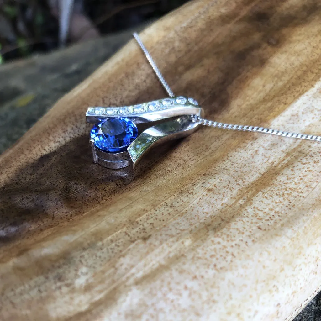 Handcrafted Tanzanite with Eight Diamond Ribbon Pendant