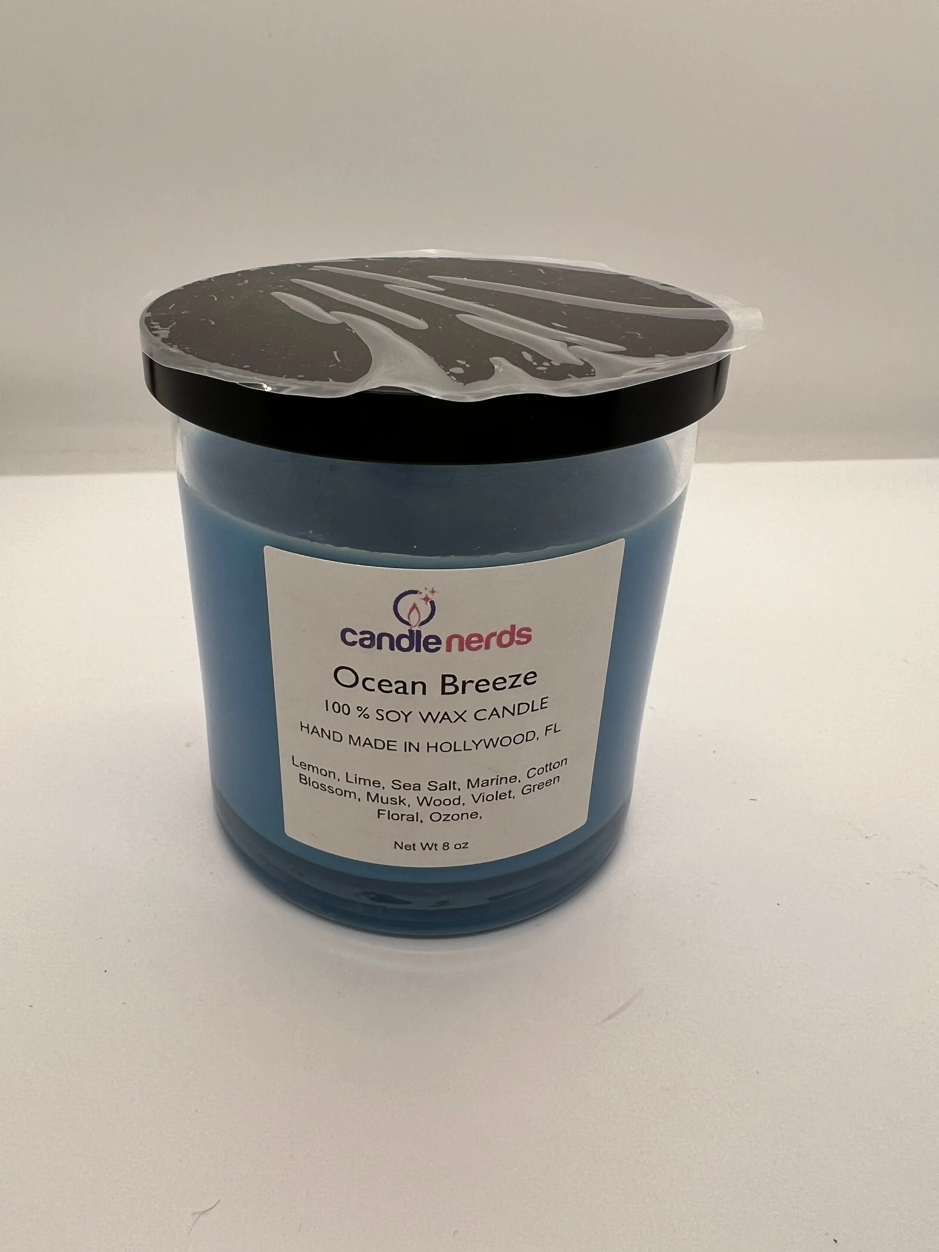 Ocean Breeze Soy Wax Candle in a Glass Jar with a Black Lid