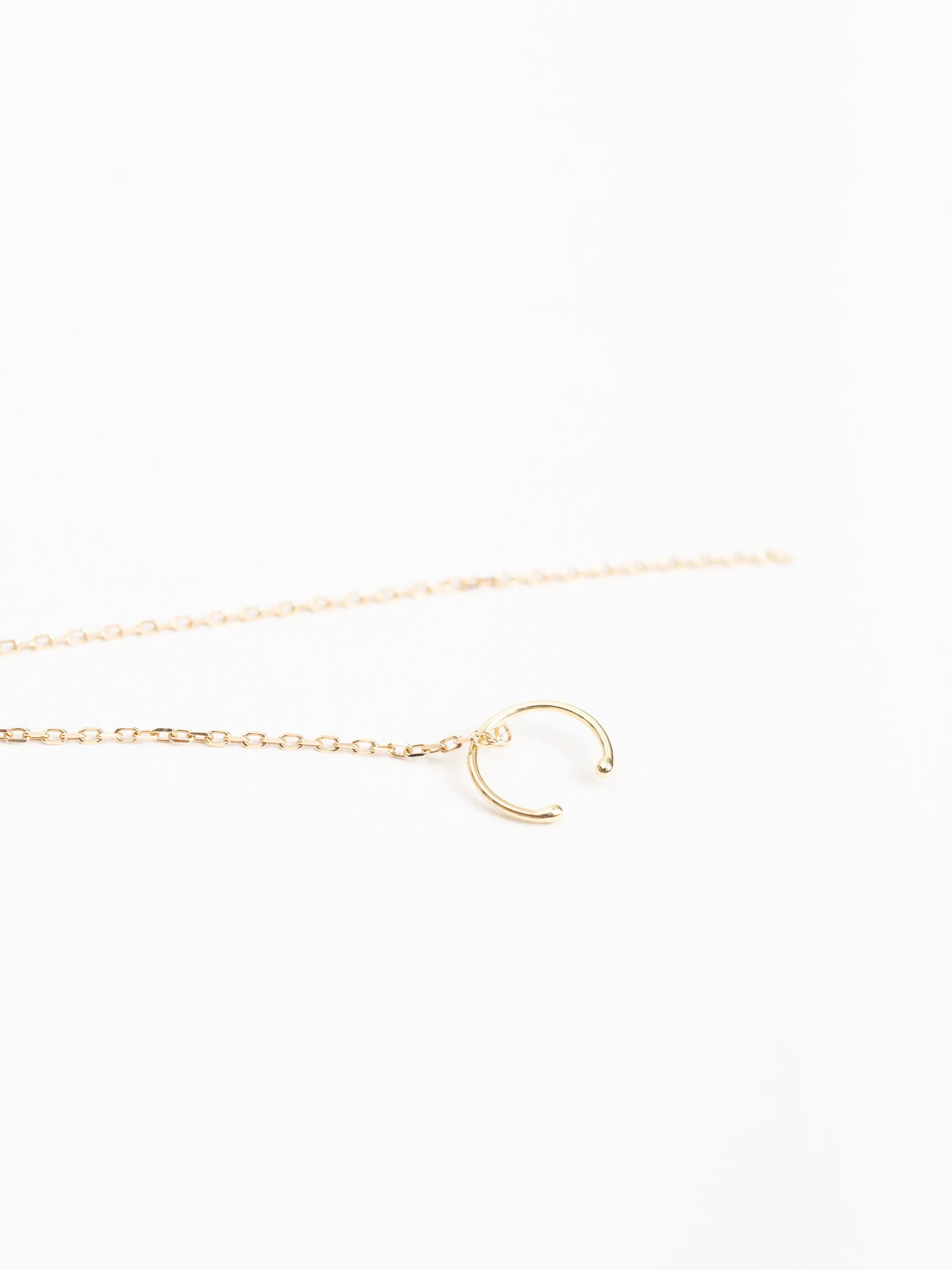 single hoop earring with hanging chain