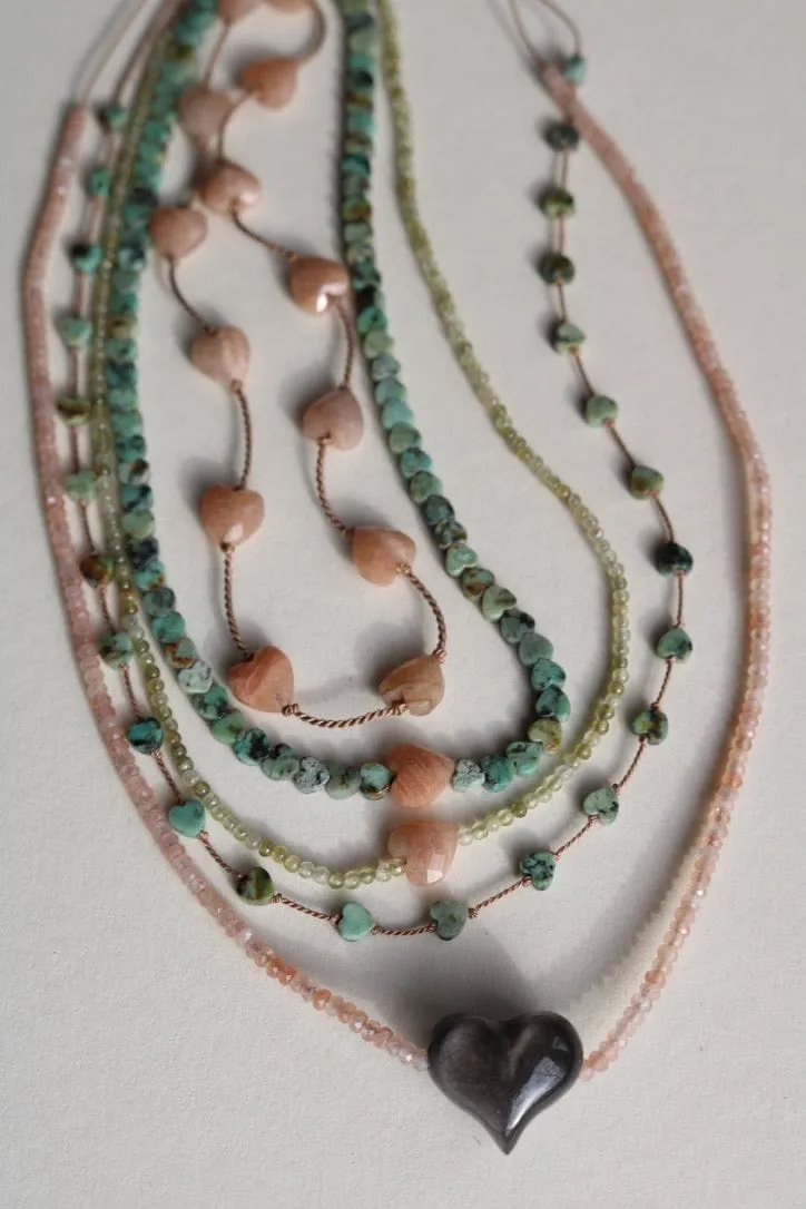 SUNSTONE HEART OM NECKLACE