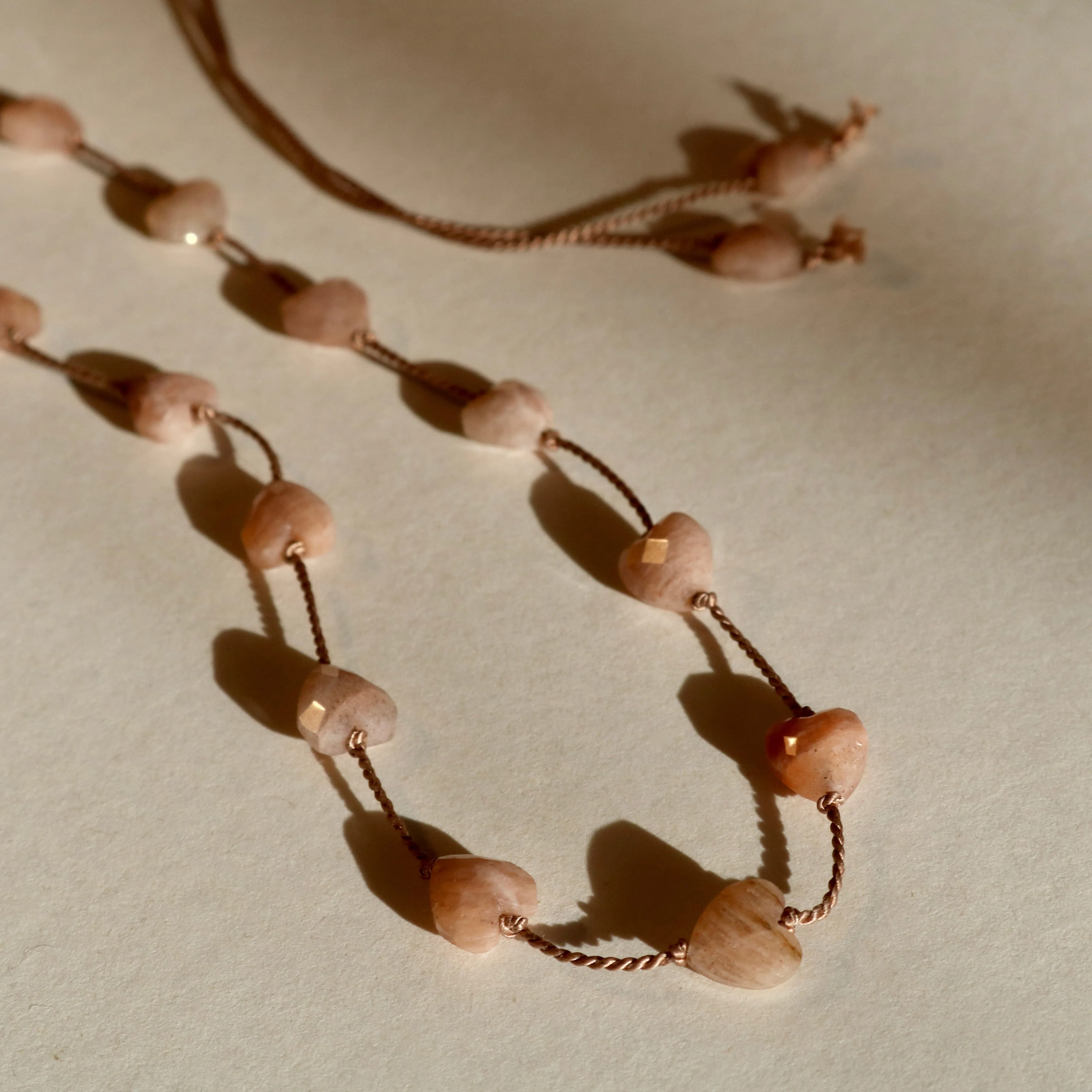 SUNSTONE HEART OM NECKLACE