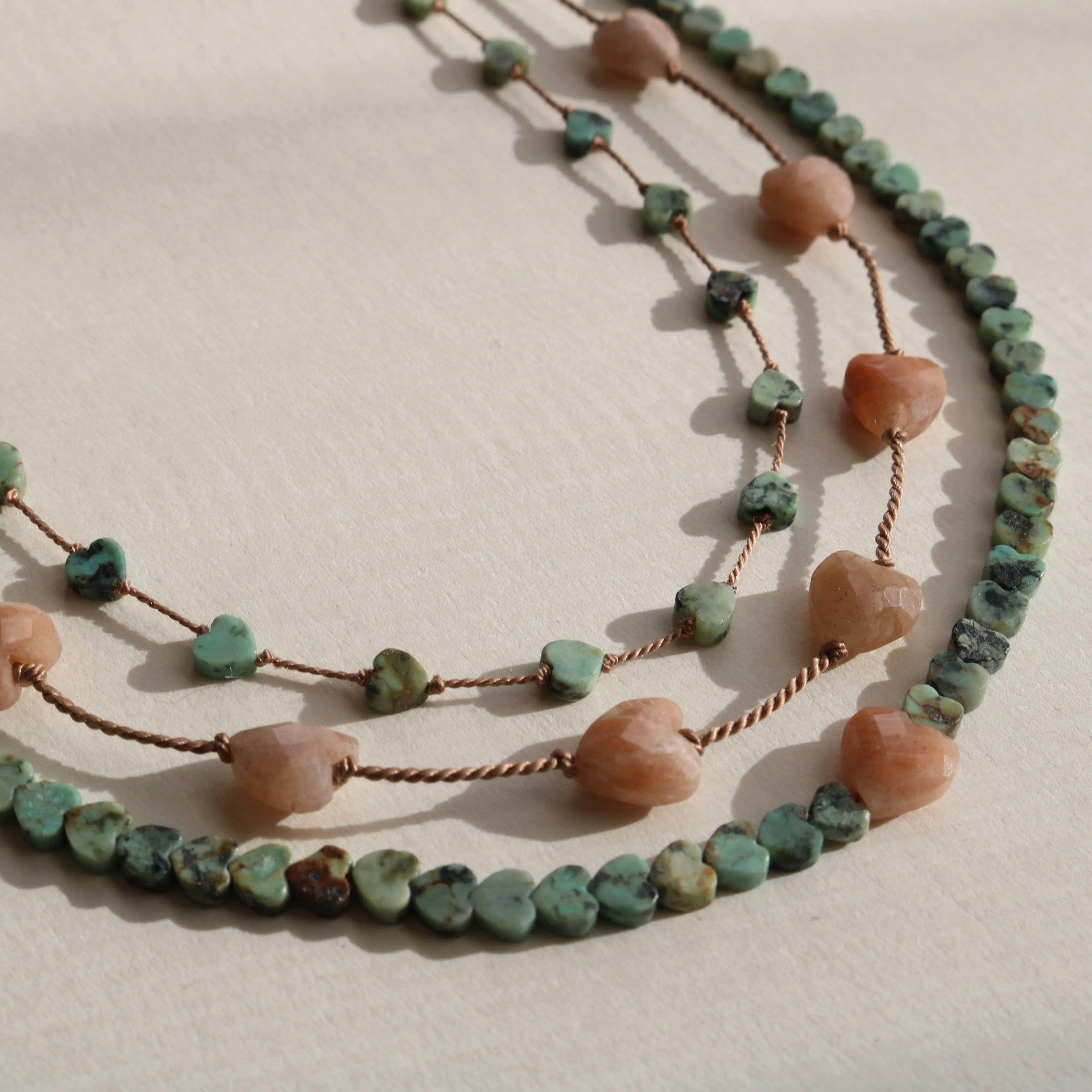 SUNSTONE HEART OM NECKLACE