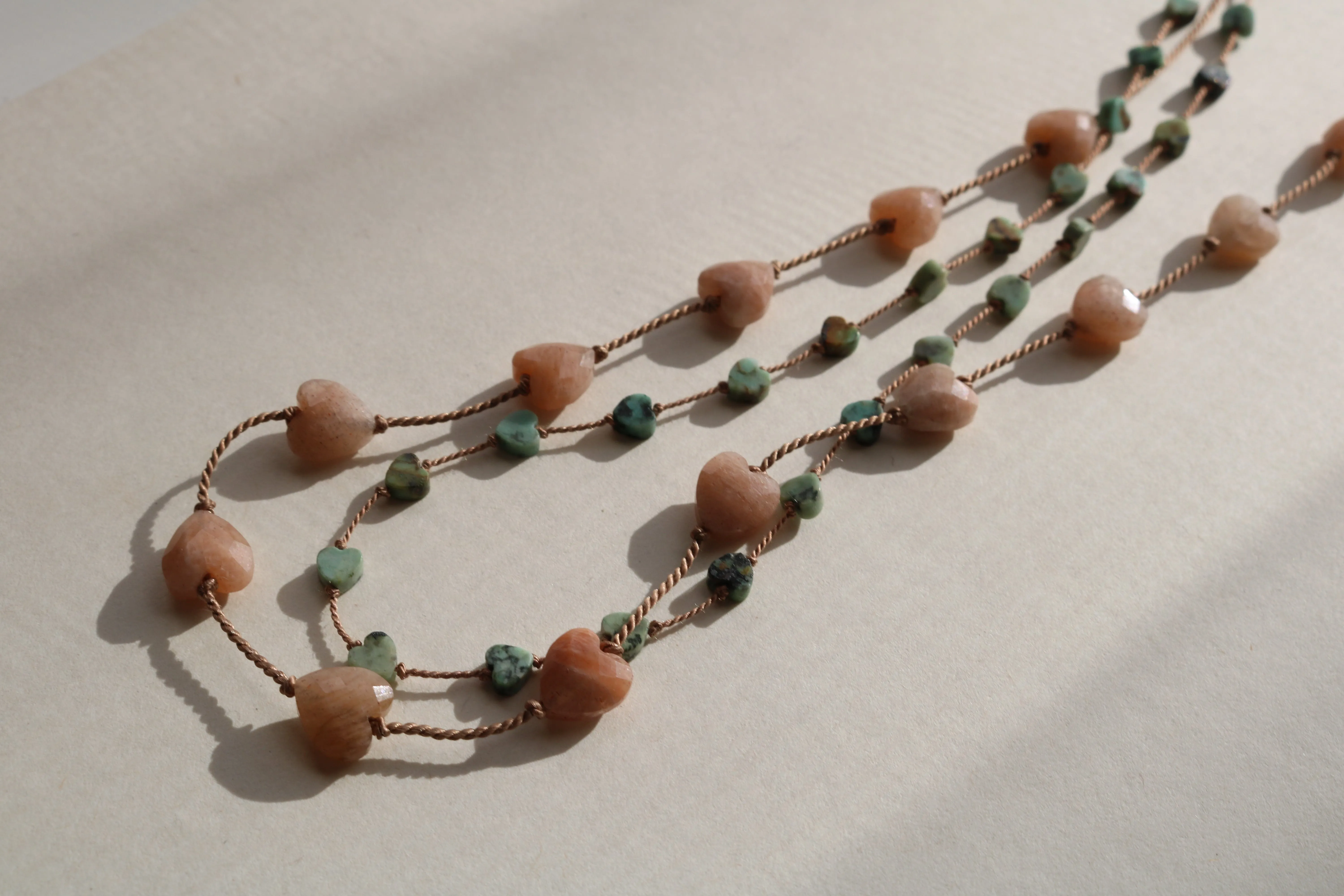 SUNSTONE HEART OM NECKLACE