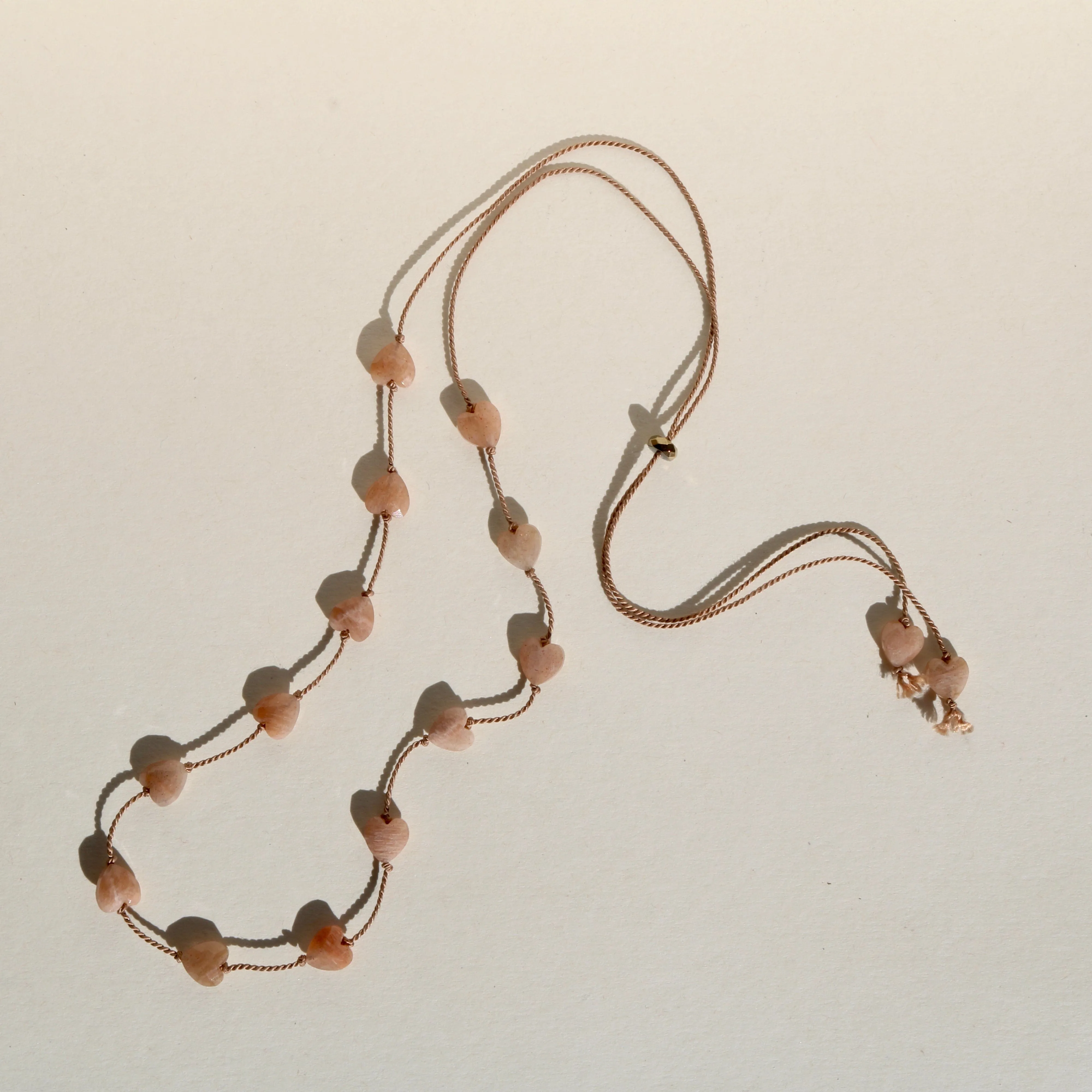 SUNSTONE HEART OM NECKLACE